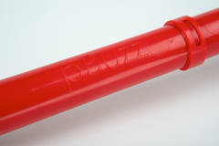 pBuzz rosso, strumento per principianti in plastica con tiro