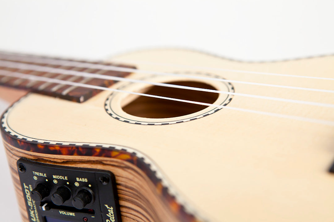 Reno RU210E Soprano Ukulele con Pickup e Accordatore (Naturale)
